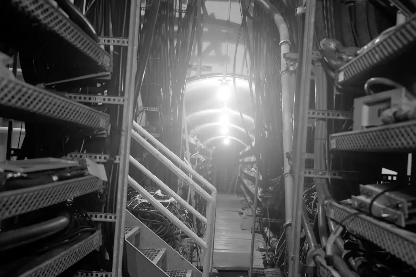 A cable tunnel opening into a cable vault, from an archival engineering survey